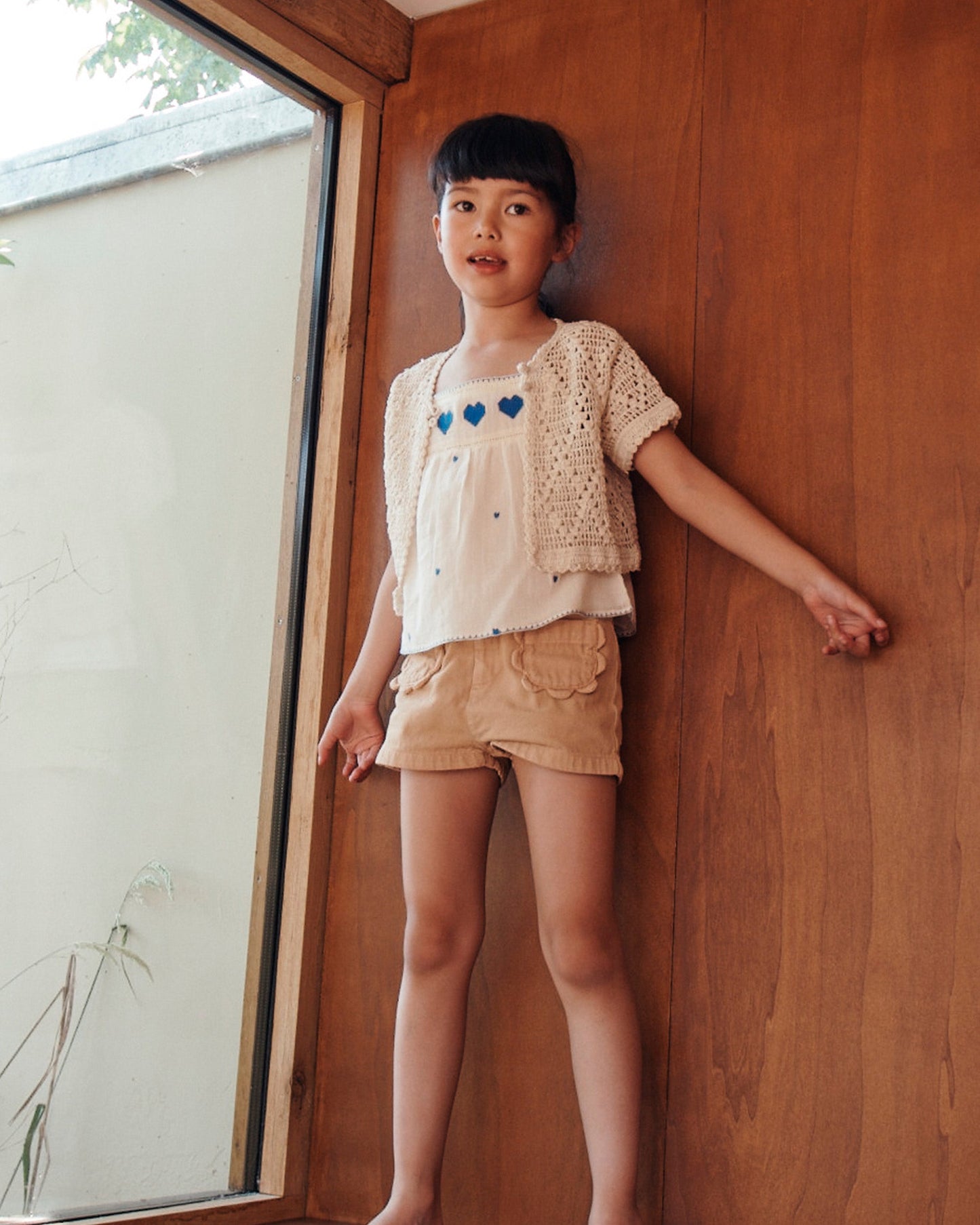Short poches fleurs uni sésame