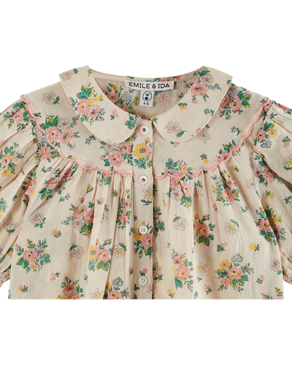 Blouse festonnée printemps rose