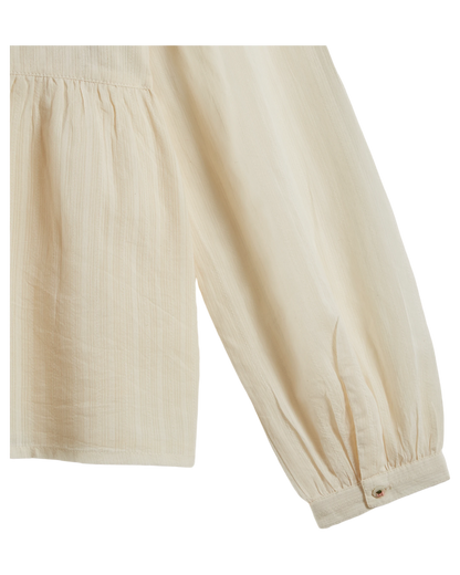 Blouse brodée smockée écru