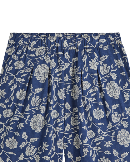 Pantalon palazzo bleu à fleurs blanches
