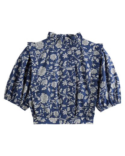 Blouse crop bleue à fleurs blanches