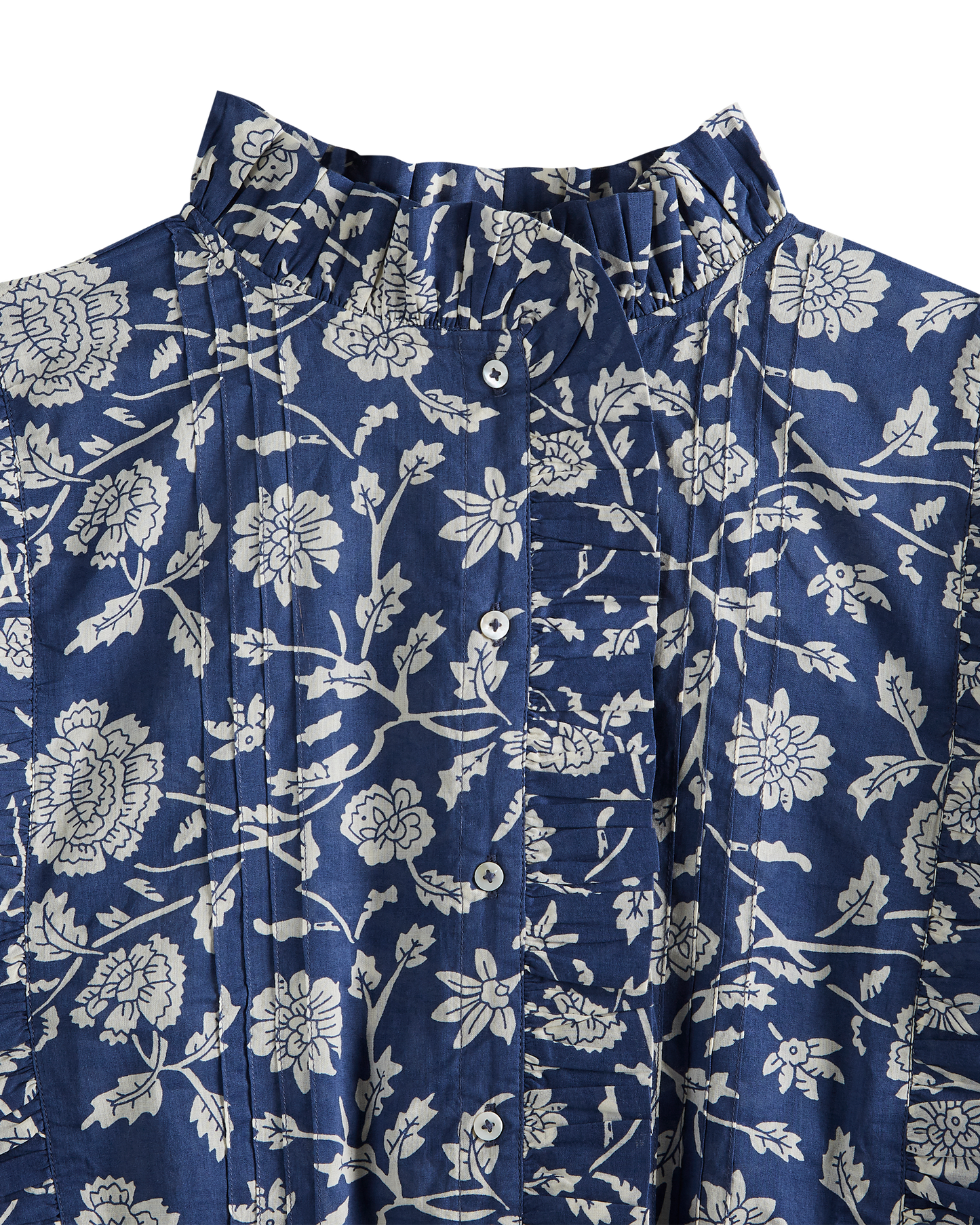Blouse crop bleue à fleurs blanches
