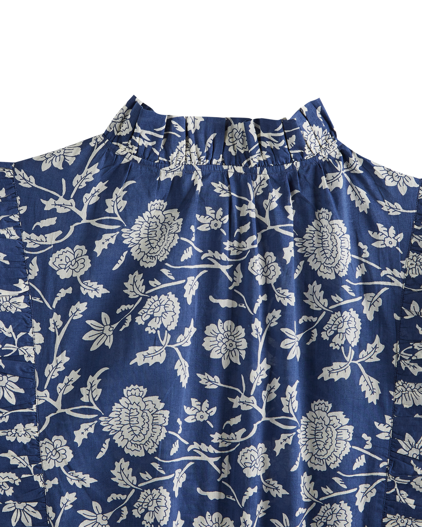 Blouse crop bleue à fleurs blanches