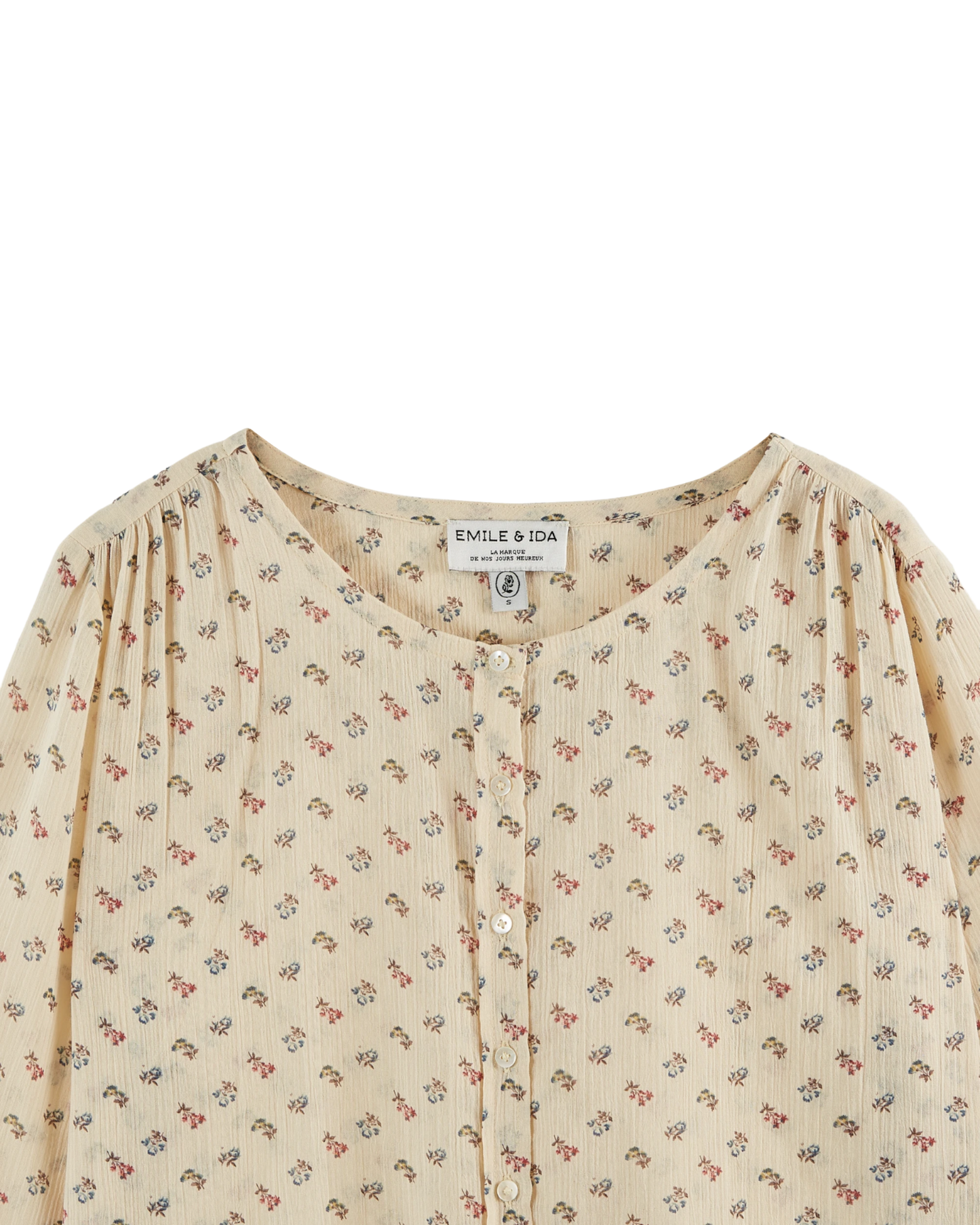Blouse écrue à fleurs roses